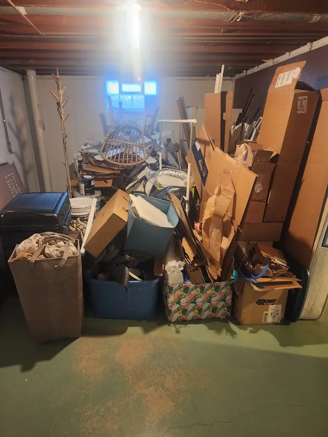 Roll-off dumpster container at job site for Yard Waste Dumpster Rental in Utica